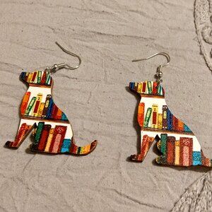 very rare and super cute back to school dog/book lover earrings.All sales are fi
